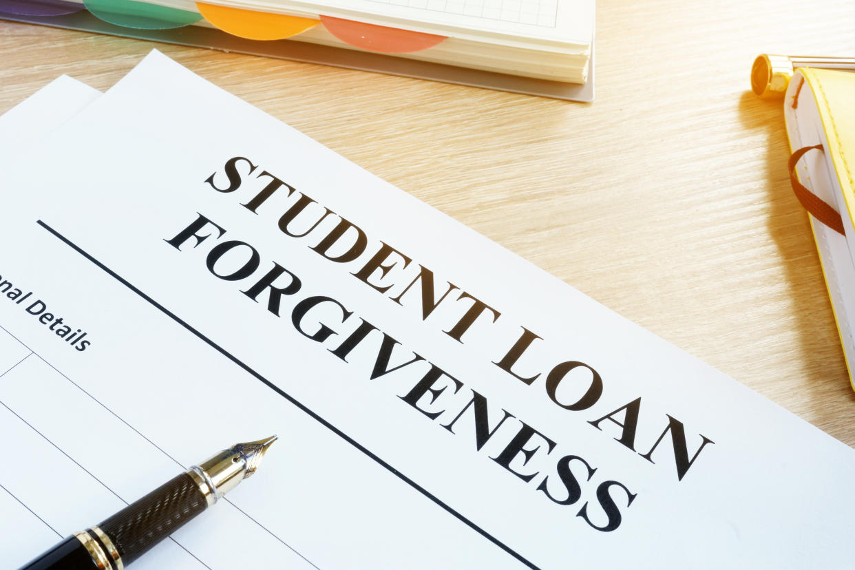 Student loan forgiveness form on a desk.