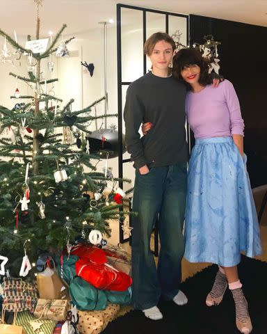 <p>Helena Christensen Instagram</p> Helena Christensen with her son Mingus Lucien Reedus on Christmas, 2022