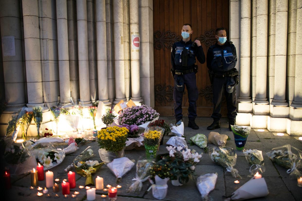 Tributes to the victims of the Nice attack outside the Notre-Dame basilica (AP)