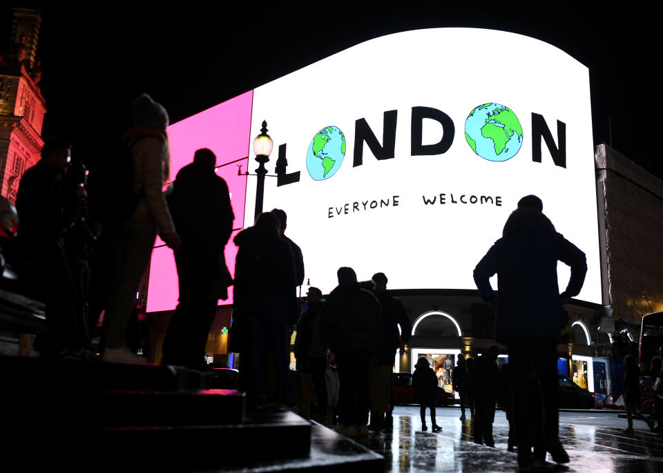 A projection by the Mayor of London’s office displaying 'London - everyone welcome' is seen at Piccadilly Circus in London, Britain January 31, 2020. REUTERS/Dylan Martinez     TPX IMAGES OF THE DAY