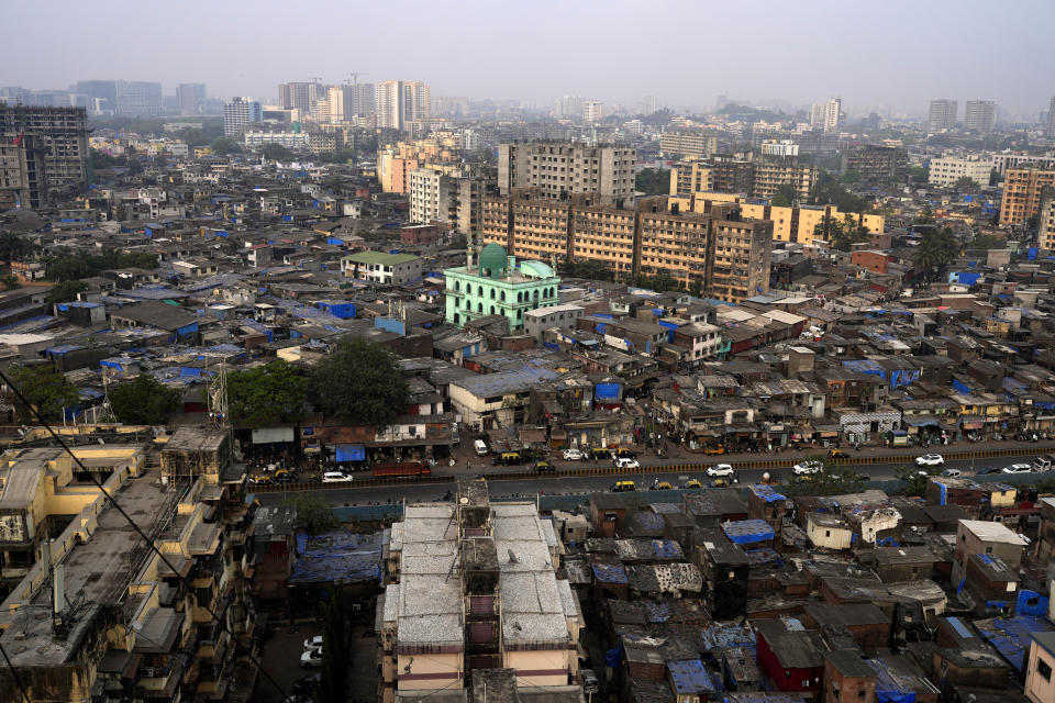 View of Dharavi slum in Mumbai, India, Thursday, March 16, 2023. The country's population has more than quadrupled since its independence from colonial rule 76 years ago. For its women, about 50% of its population, the divide is palpable in the economy, where men overwhelmingly dominate. 39 million women are employed in India's workforce compared to 361 million men, according to the Center for Monitoring the Indian Economy (CMIE). (AP Photo/Rajanish Kakade)