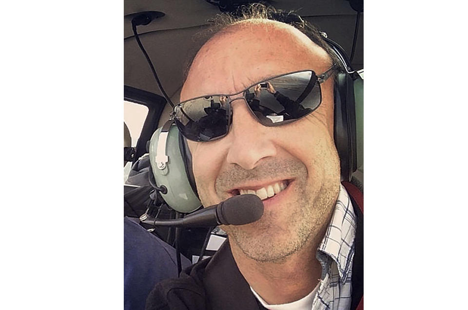 This undated photo provided by Group 3 Aviation shows helicopter pilot Ara Zobayan, who was at the controls of the helicopter that crashed in Southern California, Sunday, Jan. 26, 2020, killing all nine aboard including former Lakers star Kobe Bryant. (Group 3 Aviation via AP)