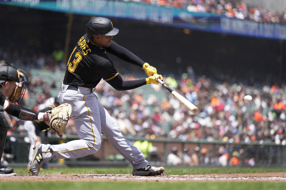 Pittsburgh Pirates' Ke'Bryan Hayes (13) hits a triple to drive in two runs against the San Francisco Giants during the third inning of a baseball game in San Francisco, Wednesday, May 31, 2023. (AP Photo/Tony Avelar)