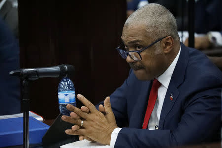 Haitian Prime minister Jack Guy Lafontant gestures during a meeting with members of the Parliament in Port-au-Prince, Haiti, July 14, 2018. REUTERS/Andres Martinez Casares