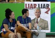 2016 Rio Olympics - Athletics - Final - Men's Decathlon Javelin Throw - Groups - Olympic Stadium - Rio de Janeiro, Brazil - 18/08/2016. A poster showing a likeness of Ryan Lochte (USA) of USA is seen at the stadium. REUTERS/Phil Noble