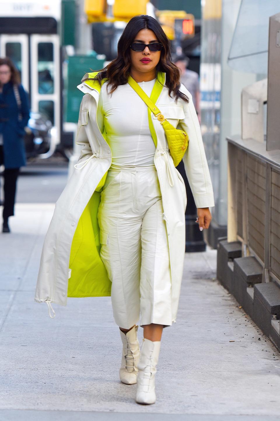 Priyanka Chopra steps out in an all-white ensemble with pops of neon on Tuesday in N.Y.C. 