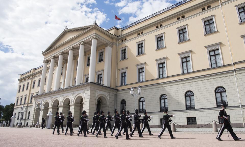 Soldiers from the King's Guards taking part in the daily changing of the guard at the Royal Palace in Oslo.