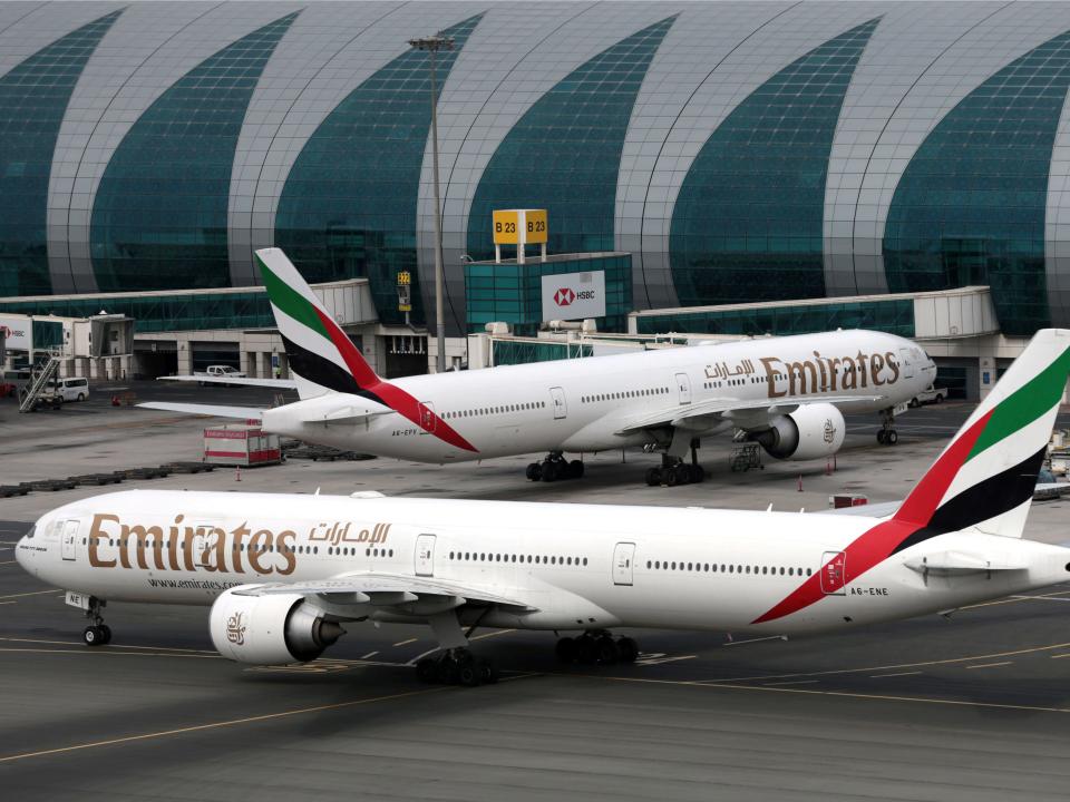 FILE PHOTO: Emirates Airline Boeing 777-300ER planes are seen at Dubai International Airport in Dubai, United Arab Emirates February 15, 2019. REUTERS/Christopher Pike/File Photo