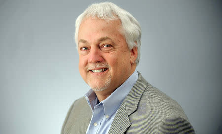 Rob Hiaasen, Capital Gazette Deputy Editor, one of the victims when an active shooter targeted the newsroom in Annapolis, Maryland, U.S. on June 28, 2018, is seen in this recent photo at an editorial board meeting. Courtesy Capital Gazette/Handout via REUTERS