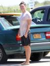 <p>Colin Jost gets ready to hit the road on Tuesday after surfing in The Hamptons, New York.</p>