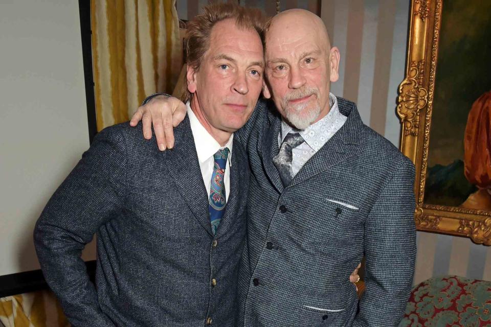 David M. Benett/Getty  Julian Sands and John Malkovich attend the premiere of <em>A Postcard from Istanbul</em> on March 3, 2015, in London