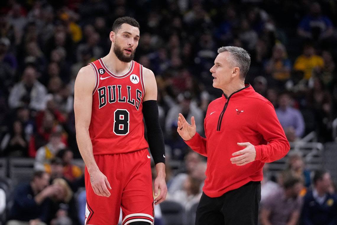 Billy Donovan talks with guard Zach Lavine during an NBA game this season. Donovan, currently the head coach of the Bulls, is in his third season with Chicago after five years coaching Oklahoma City.