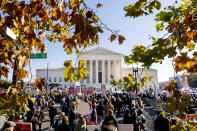 Abortion rights advocates and anti-abortion protesters demonstrate in front of the U.S. Supreme Court, Wednesday, Dec. 1, 2021, in Washington, as the court hears arguments in a case from Mississippi, where a 2018 law would ban abortions after 15 weeks of pregnancy, well before viability. (AP Photo/Andrew Harnik)