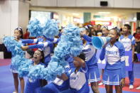 Westwood Secondary Students put up a happy face for the judges in the midst of their cheerleading routine.