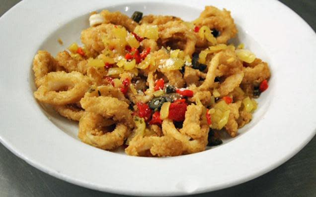 Angelo's Civita Farnese serves up calamari in its family business on Federal Hill in Providence.