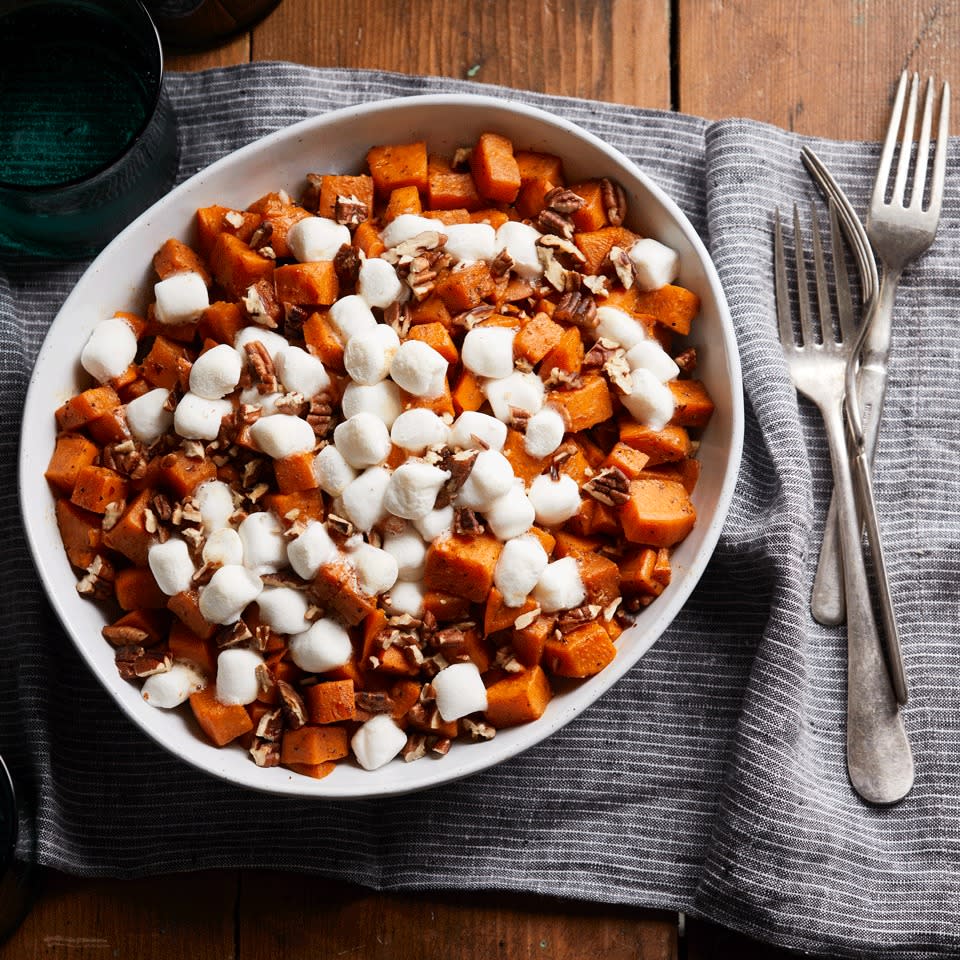 <p>The genius hack in this recipe: topping sweet potatoes with marshmallows while they're still piping hot from the slow cooker yields a baked marshmallow topping that's typical with baked sweet potato casseroles. <a href="https://www.eatingwell.com/recipe/260751/slow-cooker-sweet-potato-casserole-with-marshmallows/" rel="nofollow noopener" target="_blank" data-ylk="slk:View Recipe;elm:context_link;itc:0;sec:content-canvas" class="link ">View Recipe</a></p>