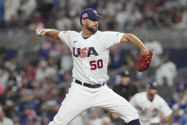 U.S. starting pitcher Adam Wainwright (50) aims a pitch during the first inning of a World Baseball Classic game against Cuba, Sunday, March 19, 2023, in Miami. (AP Photo/Marta Lavandier)