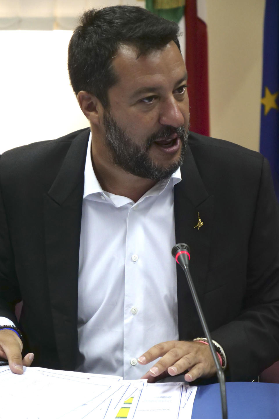 Italian Deputy Prime Minister and Interior Minister Matteo Salvini holds a security conference in Castel Volturno, southern Italy, Thursday, Aug. 15, 2019. (AP Photo/Paolo Santalucia)