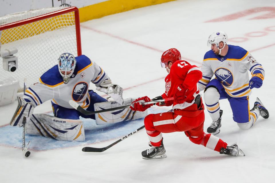 Detroit Red Wings right wing Daniel Sprong (17) shoots the puck against Buffalo Sabres goaltender Ukko-Pekka Luukkonen (1) during the second period at Little Caesars Arena in Detroit on Sunday, April 7, 2024.