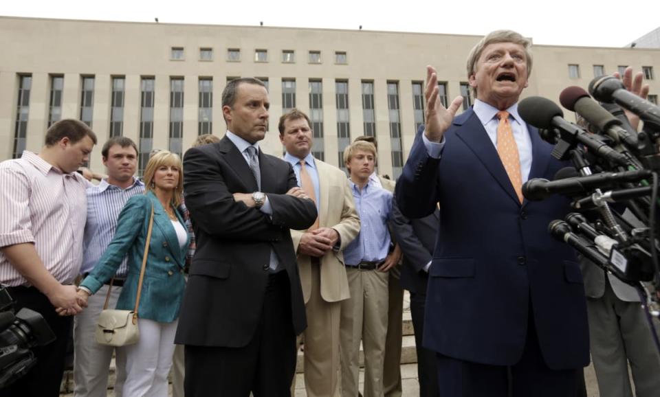 <div class="inline-image__caption"><p>Rusty Hardin speaks at the microphone after a jury acquitted former baseball star Roger Clemens (in background) of criminal charges related to lying to Congress about using performance-enhancing drugs.</p></div> <div class="inline-image__credit">REUTERS/Kevin Lamarque</div>