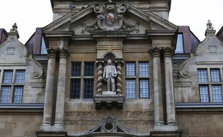 The statue of Cecil Rhodes is seen on the facade of Oriel College in Oxford, southern England, in this file photograph dated December 30, 2015. REUTERS/Eddie Keogh/Files