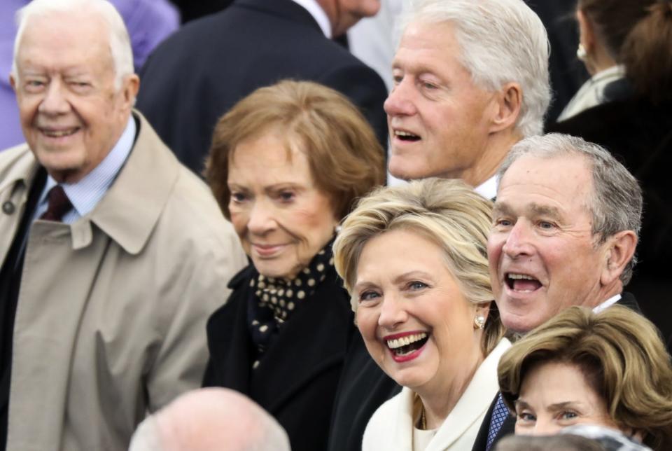 From left, former President Jimmy Carter, wife Rosalynn Carter, former President Bill Clinton, wife Hillary Clinton and former President George W. Bush wait for the 58th Presidential Inauguration to begin at the U.S. Capitol on Friday, Jan. 20, 2017.