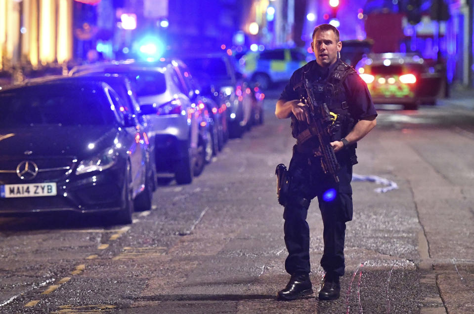 <p>An armed police stands on Borough High Street as police are dealing with an incident on London Bridge in London, Saturday, June 3, 2017. Witnesses reported a vehicle hitting pedestrians and injured people on the ground. (Dominic Lipinski/PA via AP) </p>