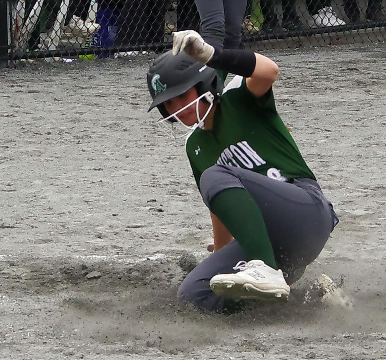 Calli Pineau of Abington scores from 3rd for the Green Wave's 7th run against East Bridgewater in the 4th inning on Tuesday, April 30, 2024.