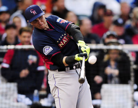 National League infielder Troy Tulowitzki (2) of the Colorado Rockies at bat in the first round during the 2014 Home Run Derby the day before the MLB All Star Game at Target Field. Jul 14, 2014; Minneapolis, MN, USA; Jeff Curry-USA TODAY Sports -