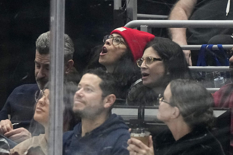 Comedian Sarah Silverman, center top, watches during the first period of an NHL hockey game between the Los Angeles Kings and the Edmonton Oilers Saturday, Dec. 30, 2023, in Los Angeles. (AP Photo/Mark J. Terrill)