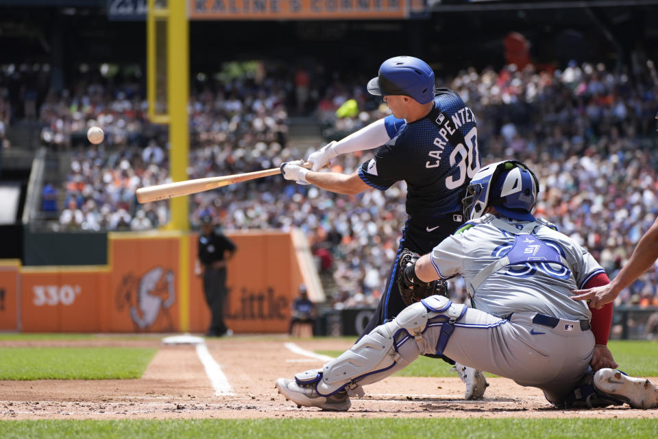 Detroit Tigers' Kerry Carpenter hits a two-run home run against the Toronto Blue Jays in the first inning of a baseball game, Saturday, May 25, 2024, in Detroit. (AP Photo/Paul Sancya)