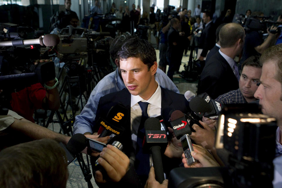 Pittsburgh Penguins' Sidney Crosby speaks with reporters following collective bargaining talks, Tuesday, Aug. 14, 2012, in Toronto. (AP Photo/The Canadian Press, Chris Young)