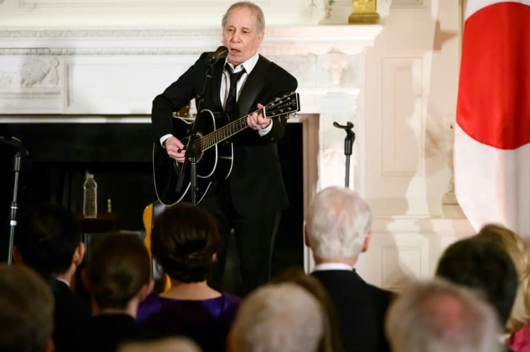 US singer-songwriter Paul Simon performs during a reception hosted by US President Joe Biden and First Lady Jill Biden for Japanese Prime Minister Fumio Kishida and his wife Yuko Kishida in the State Dining Room of the White House in Washington, DC, April 10, 2024. (Mandel NGAN)