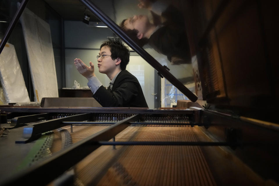 Canadian pianist Eric Guo talks to The Associated Press about playing music by Frederic Chopin on 19th century pianos, including one owned by the Romantic-era composer, to mark Chopin's 214th birthday, at the Fryderyk Chopin Institute, in Warsaw, Poland, Saturday, March 2, 2024. Guo won a quintannual competition to play Chopin on period instruments organized by the Institute. (AP Photo/Czarek Sokolowski)