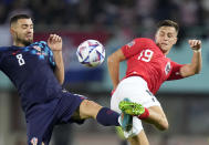 FILE - Croatia's Mateo Kovacic, left, duels for the ball with Austria's Christoph Baumgartner during the UEFA Nations League soccer match between Austria and Croatia at the Ernst Happel Stadion in Vienna, Austria, Sunday, Sept. 25, 2022. (AP Photo/Florian Schroetter, File)
