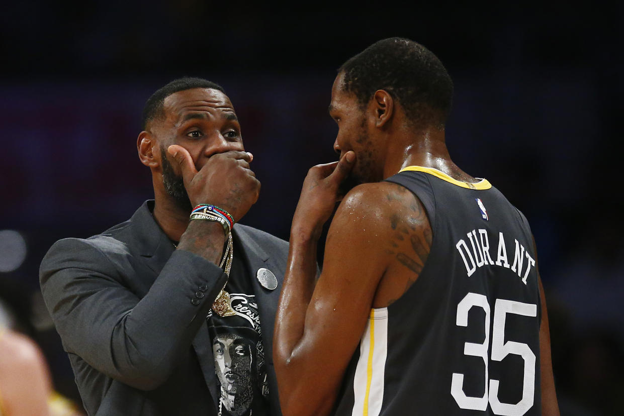 LeBron James and Kevin Durant will meet on Christmas for the first time since 2019. (Yong Teck Lim/Getty Images)