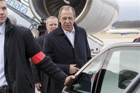 Russian Foreign Minister Sergey Lavrov arrives for the Geneva-2 talks on Syria, at Geneva International airport January 21, 2014. REUTERS/Salvatore Di Nolfi/Pool