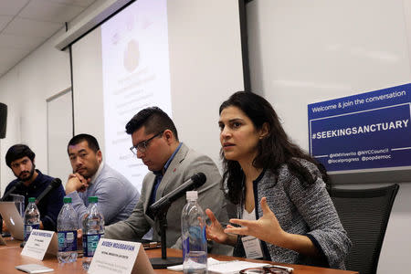 Avideh Moussavian, (R) a Policy Attorney for the National Immigration Law Center, speaks during a panel discussion promoting 'Justice and Equity in an Era of Indiscriminate Enforcement and Fear' at the National Conference on Sanctuary Cities in New York City, U.S., March 28, 2017. REUTERS/Lucas Jackson