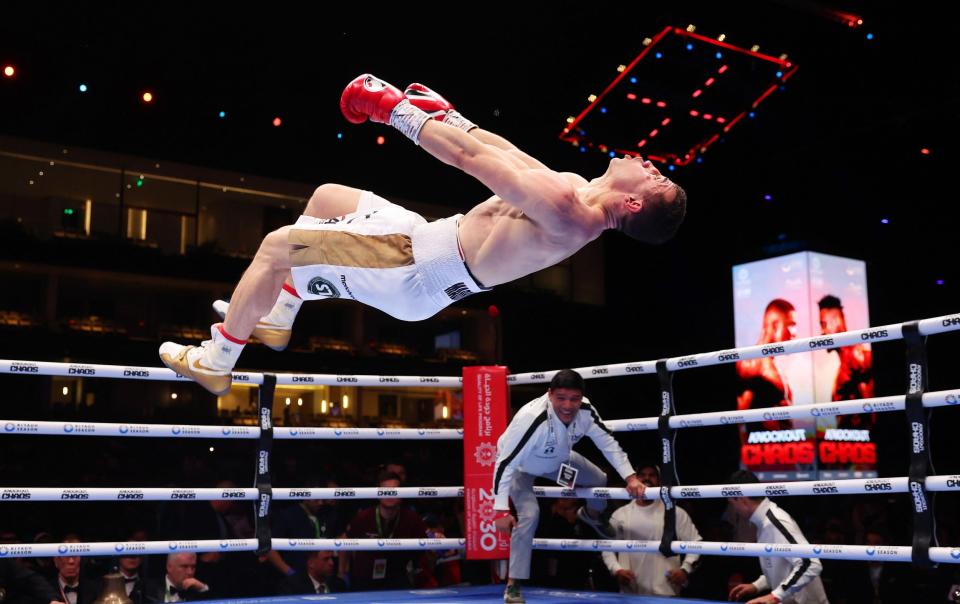 Israil Madrimov celebrates victory over Magomed Kurbanov (not pictured) with a backflip during the WBA World Super Welterweight title fight between Israil Madrimov and Magomed Kurbanov on the Knockout Chaos boxing card at the Kingdom Arena on March 08, 2024 in Riyadh, Saudi Arabia