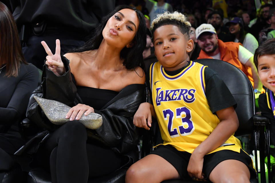 LOS ANGELES, CALIFORNIA - DECEMBER 05: Kim Kardashian and Saint West attend a basketball game between the Los Angeles Lakers and the Phoenix Suns at Crypto.com Arena on December 05, 2023 in Los Angeles, California. NOTE TO USER: User expressly acknowledges and agrees that, by downloading and or using this photograph, User is consenting to the terms and conditions of the Getty Images License Agreement. (Photo by Allen Berezovsky/Getty Images)