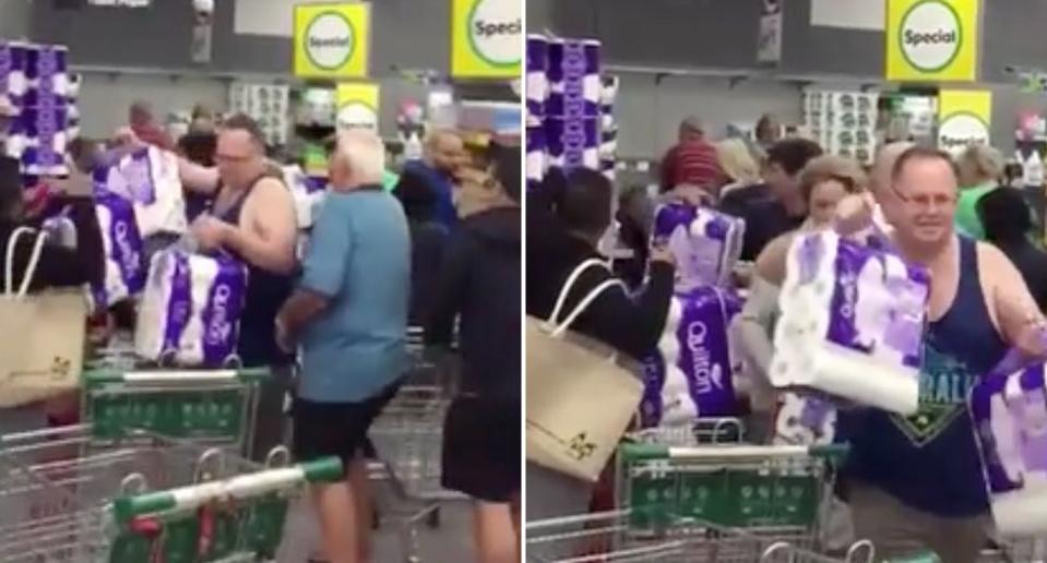 Shoppers at Woolworths in Revesby scramble to buy toilet paper.