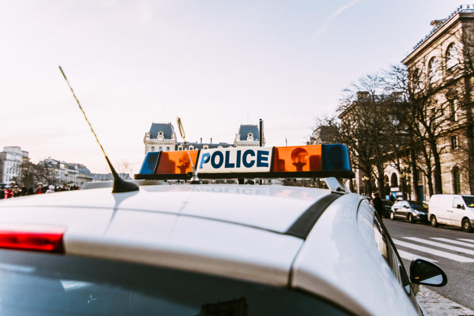 A police car's sirens are shown