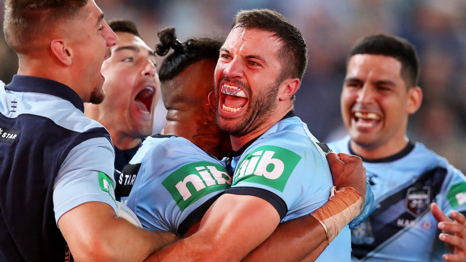 Josh Addo-Carr of the Blues celebrates after scoring a try with James Tedesco of the Blues during game two of the 2020 State of Origin series. (Getty Images)