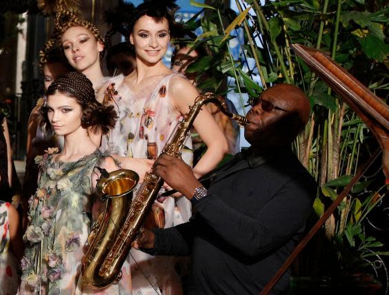 Dibango performs at a fashion event in Paris in 2018 (AP)