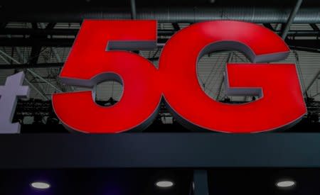 FILE PHOTO: A 5G sign is seen during the Mobile World Congress in Barcelona, Spain February 28, 2018. REUTERS/Yves Herman