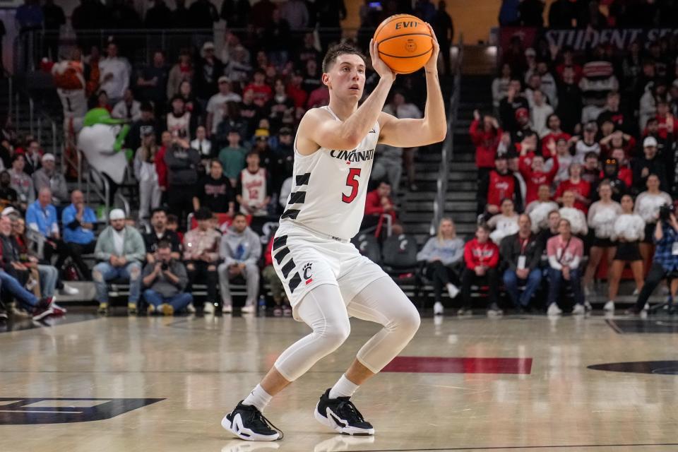 Guard CJ Fredrick battled ailments in three seasons at Iowa before transferring to Kentucky prior to the 2021-22 campaign. He now plays for Cincinnati.