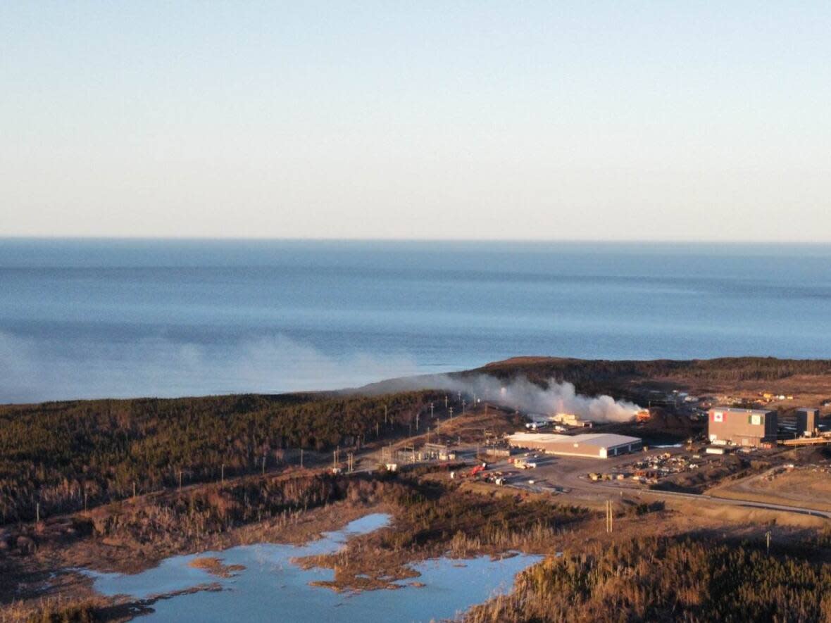 Smoke is seen billowing from the Donkin coal mine in Cape Breton Sunday evening. (Daniel Dillon/Facebook - image credit)