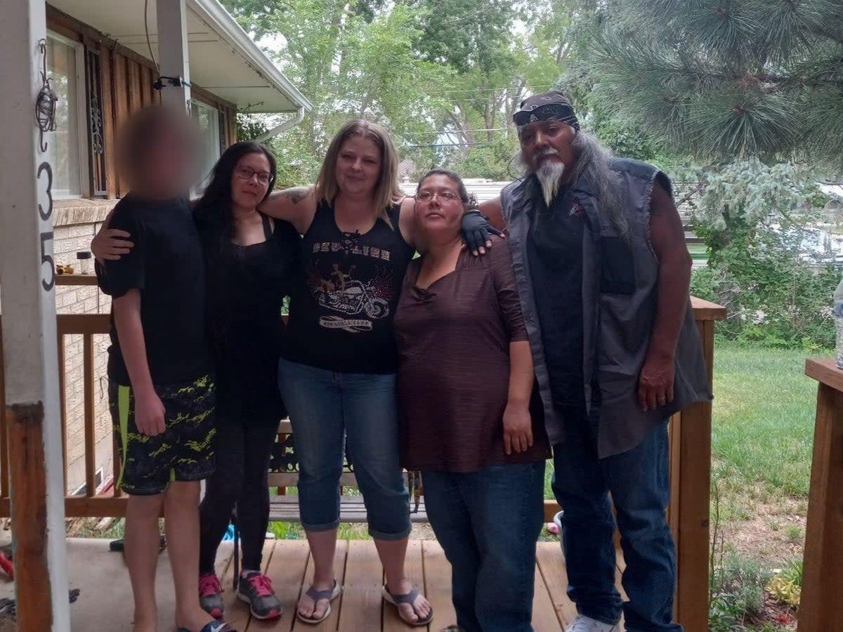 The 14-year-old boy who died is pictured, left, along with Rebecca Vance, Trevala Jara, Christine Vance and Ms Jara’s husband days before the trio left for the Colorado wilderness  (The Gazette / Trevala Jara)