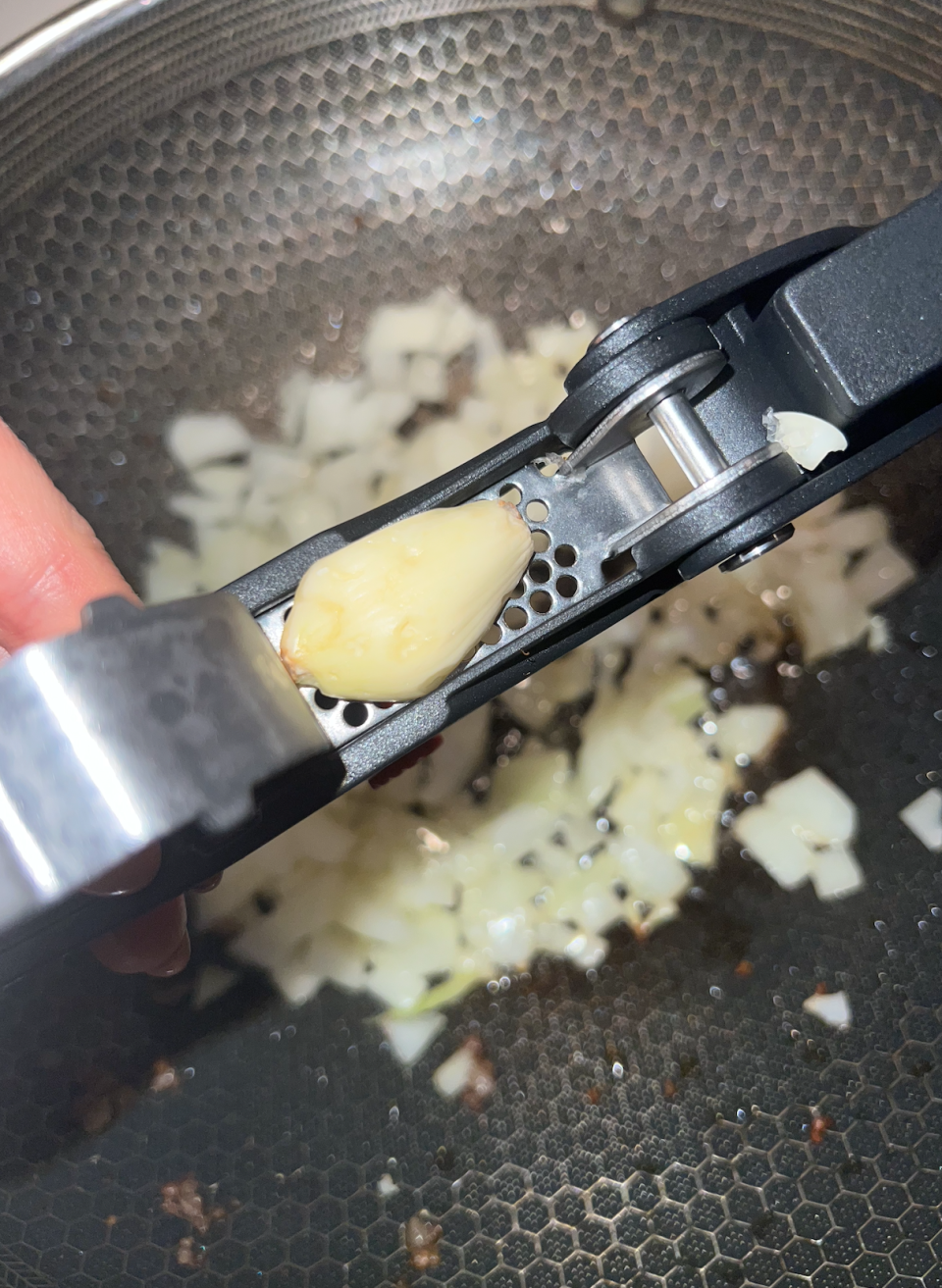 Garlic being minced