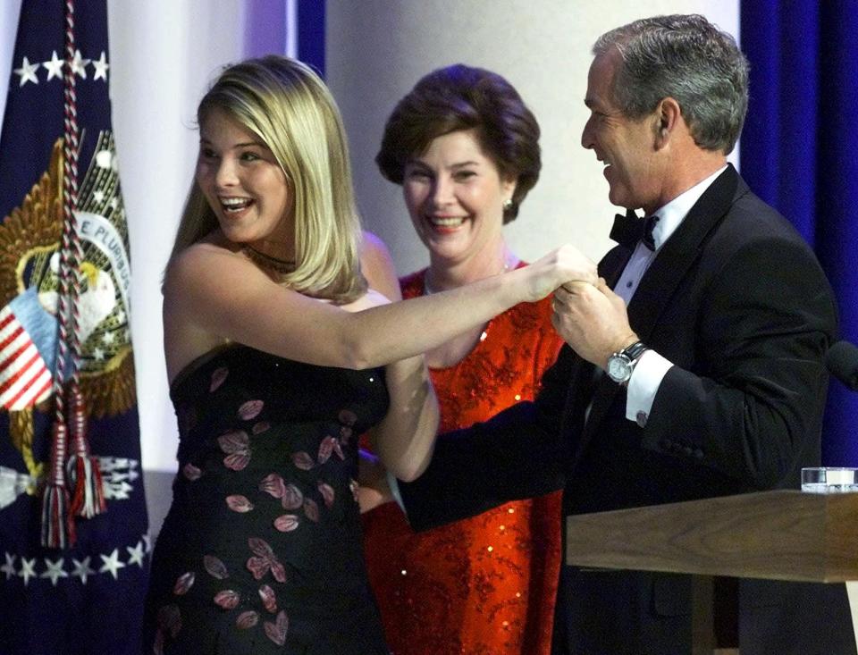 Jenna Bush dances with George W Bush at an inaugural ball